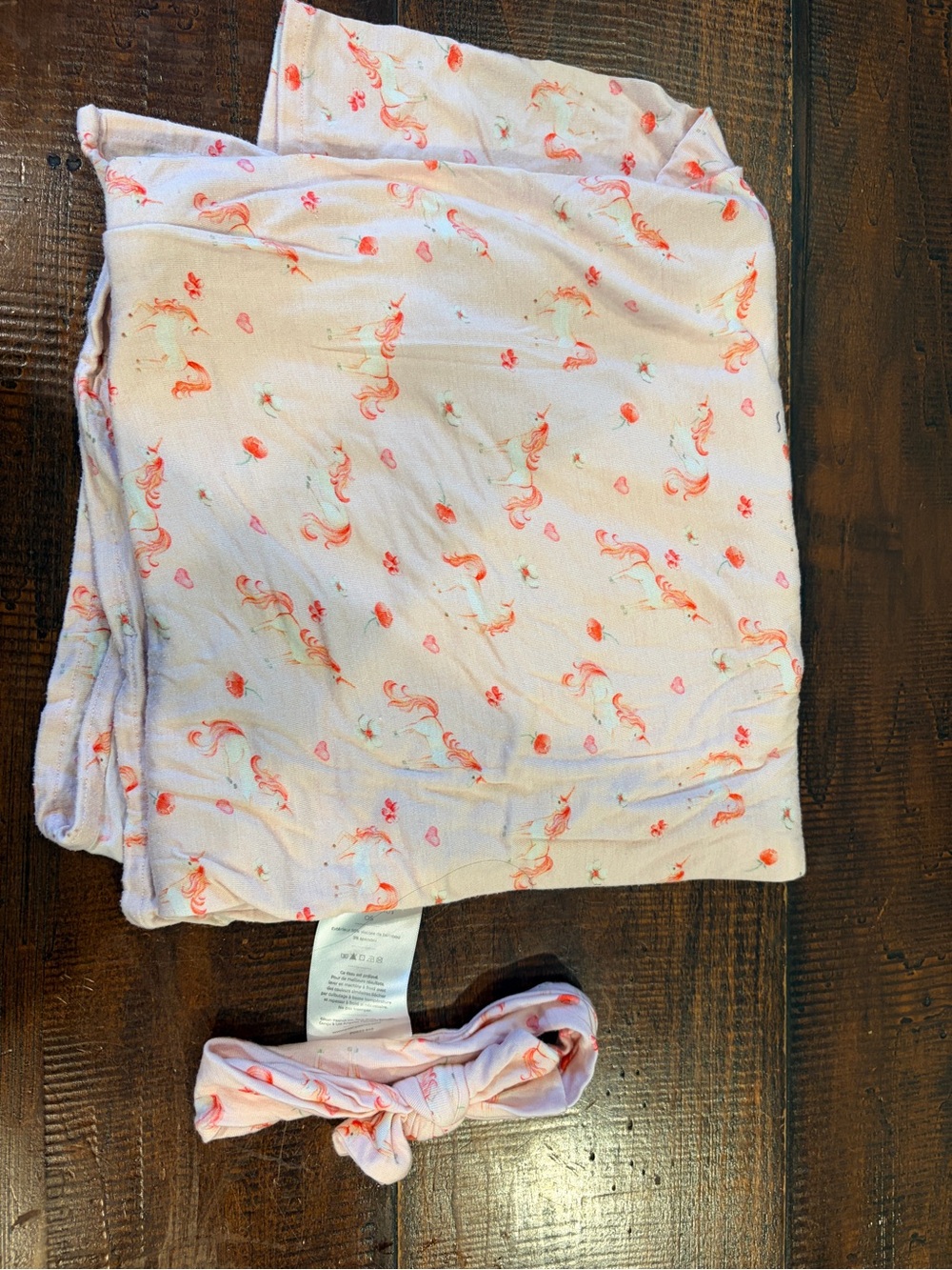 Posh peanut unicorn swaddle blanket and bow headband
